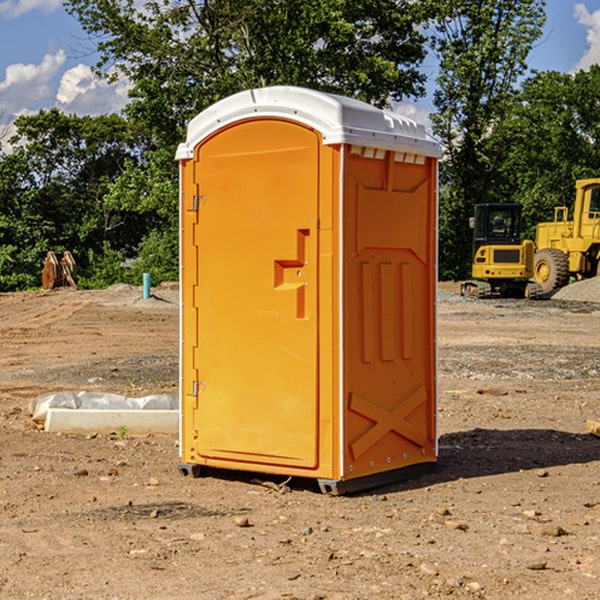 what is the cost difference between standard and deluxe portable restroom rentals in Ute